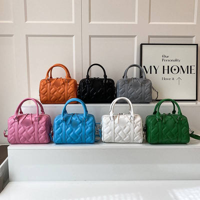 Quilted Barrel Satchel with Dual Handles and Crossbody Strap